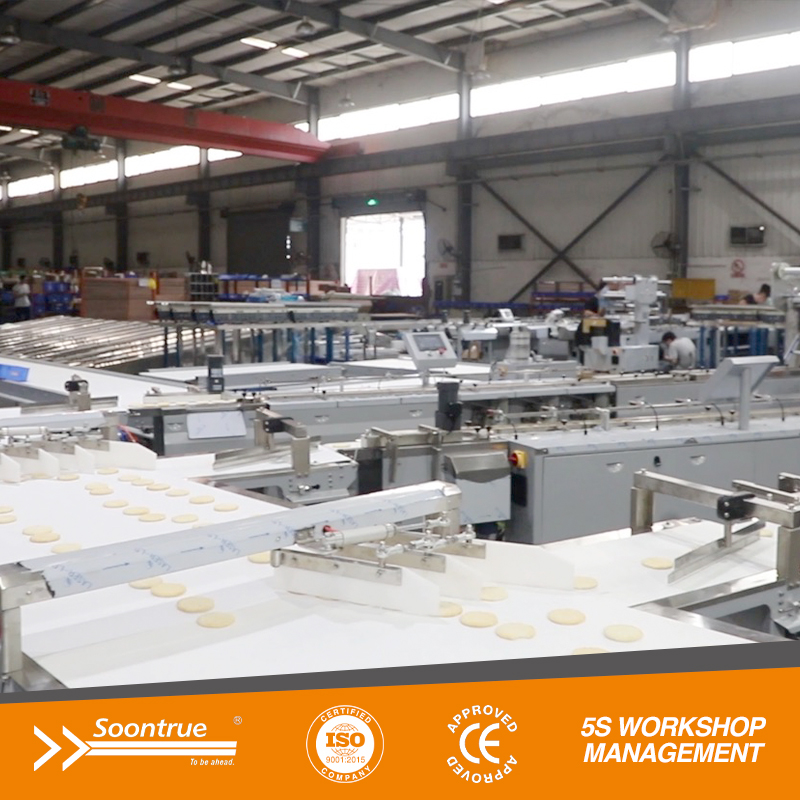 Sistema de alimentación con clasificación lateral