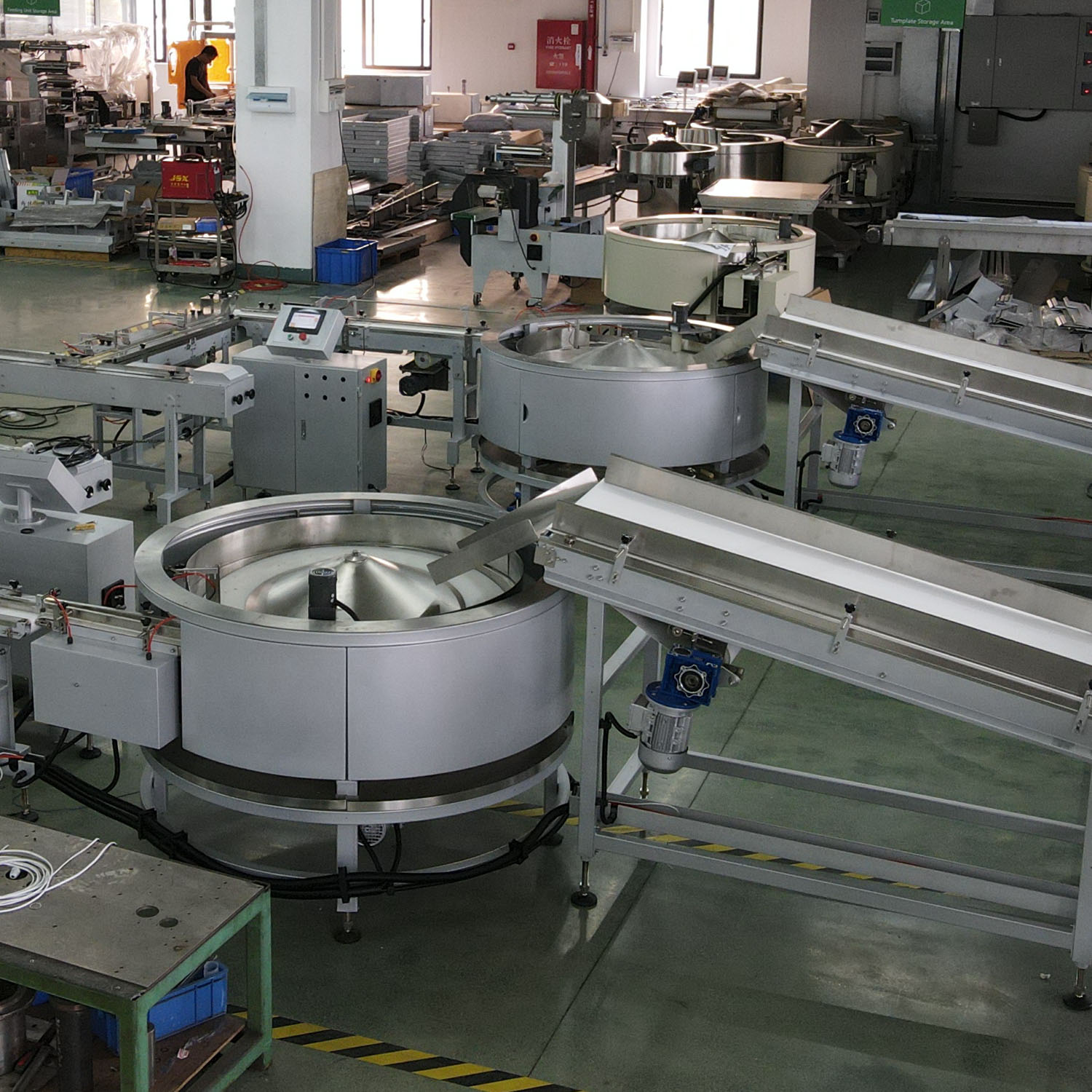 Sistema de alimentación por plato giratorio