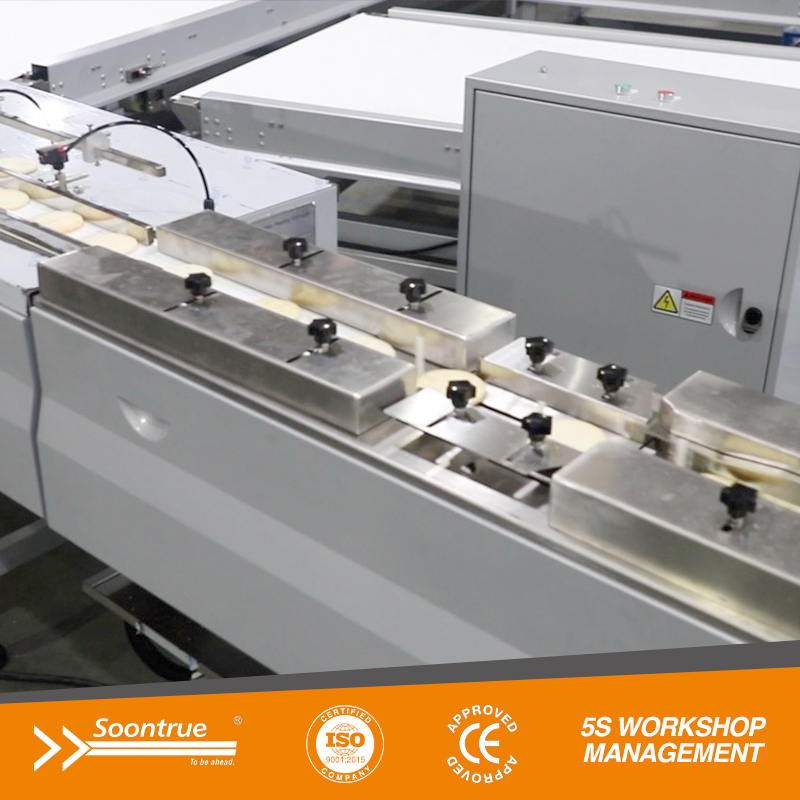 Sistema de alimentación con clasificación lateral